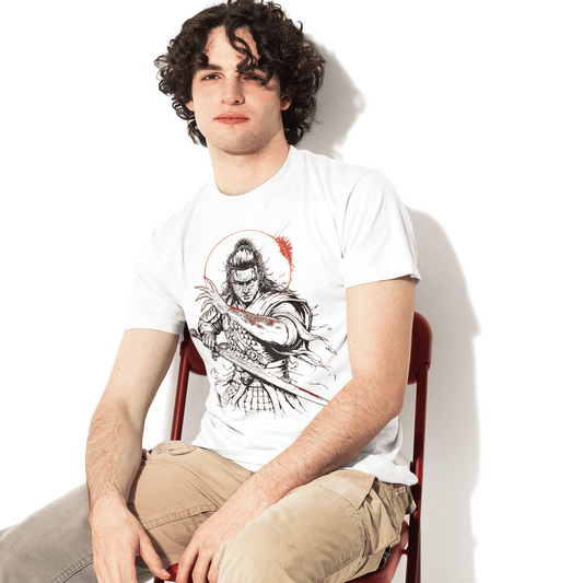 Side seated model view of The Blood of Dawnwalker Coen Sword T-Shirt showing the front sword artwork.