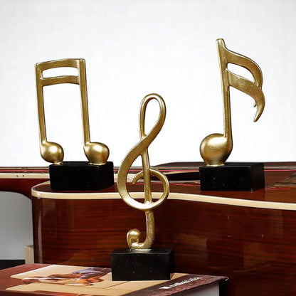Musical Note Resin Sculpture – Elegant Gold Figurine for Home & Studio Decor  Geniogoods