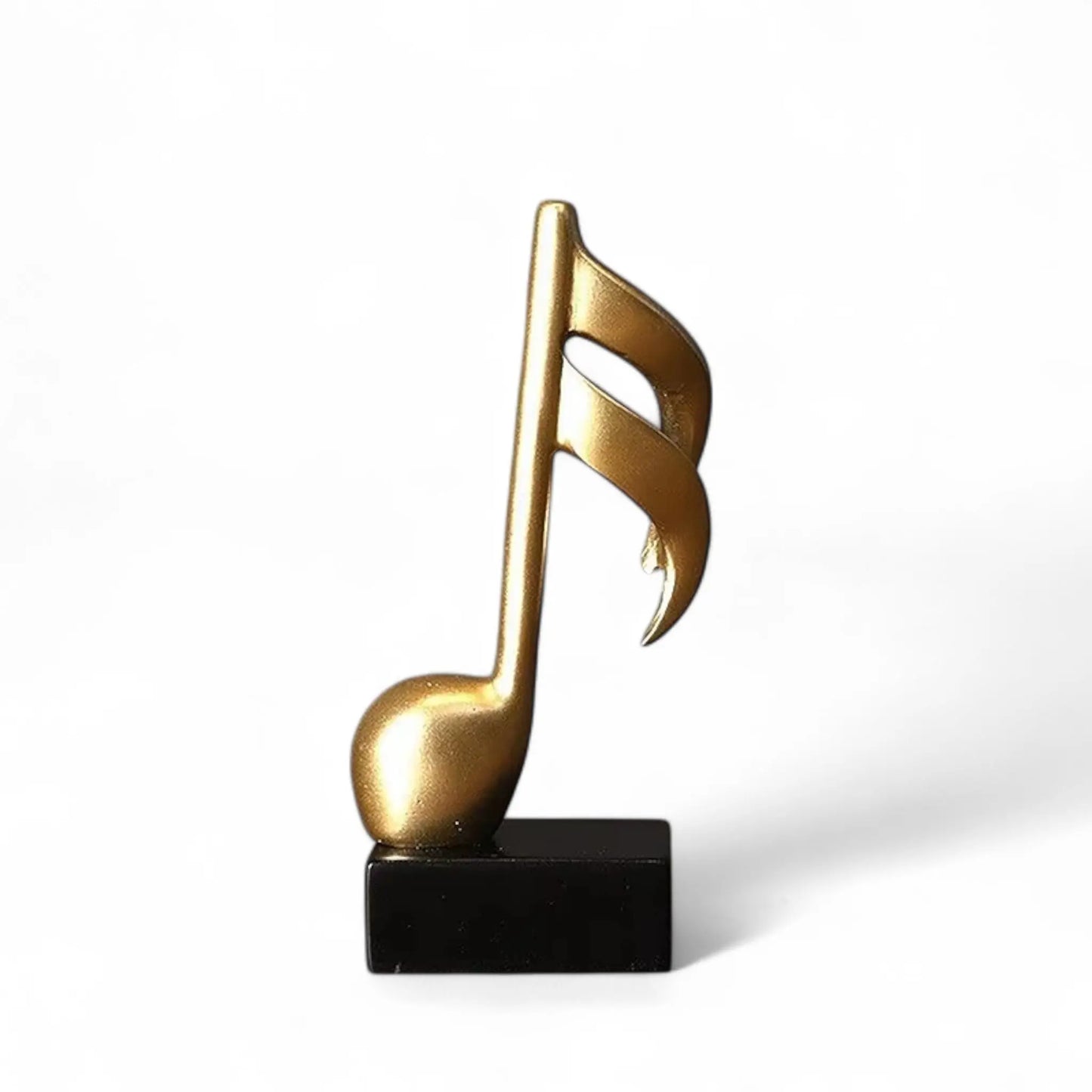 Musical Note Resin Sculpture – Elegant Gold Figurine for Home & Studio Decor  Geniogoods