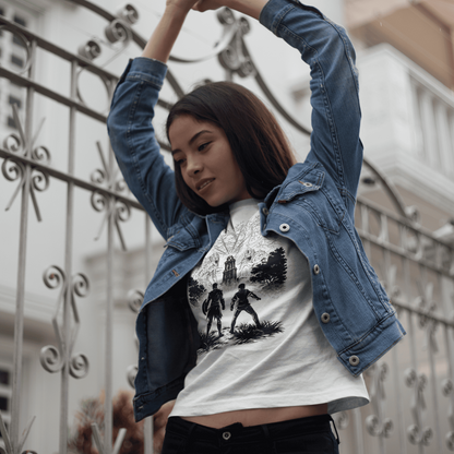 Person wearing a denim jacket and graphic t-shirt with a building in the background