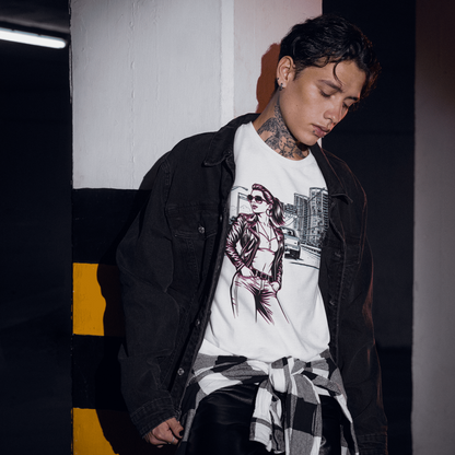 Person wearing a white graphic t-shirt and black jacket in an urban setting