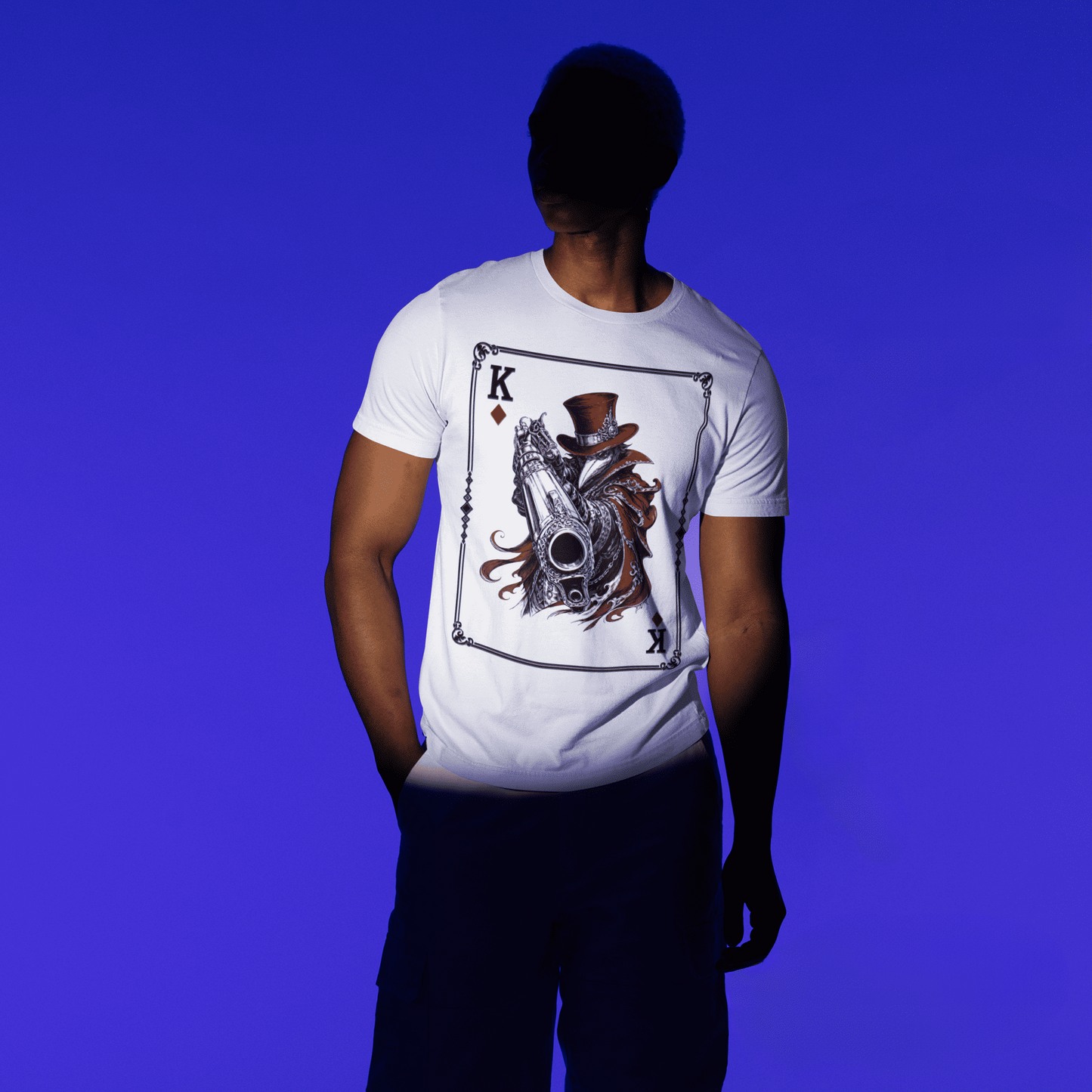 Full-body front view of a model wearing the white Crowsworn King of Diamonds T-Shirt with Crimson Gambit artwork