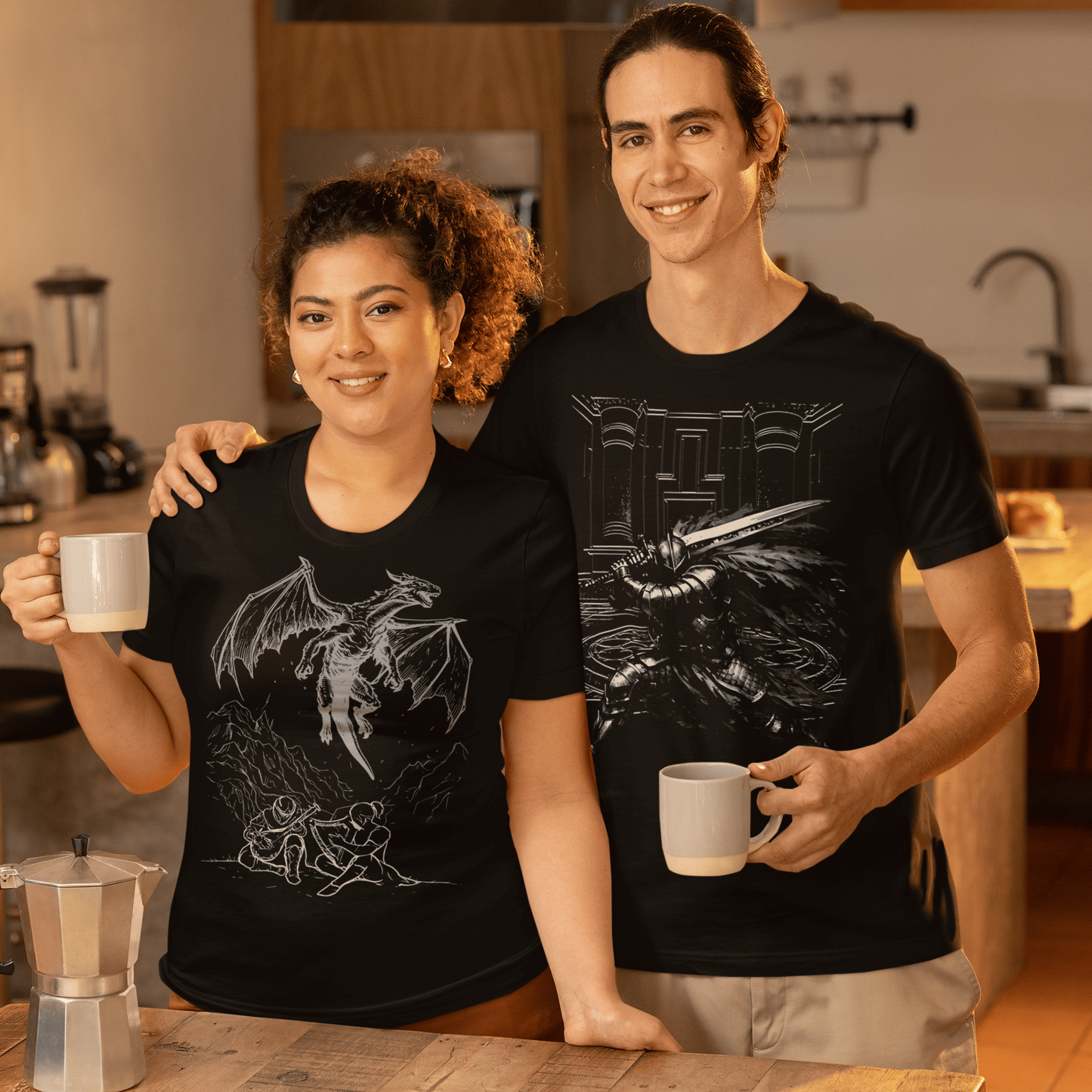 Two people wearing black t-shirts with graphic designs, standing in a kitchen.
