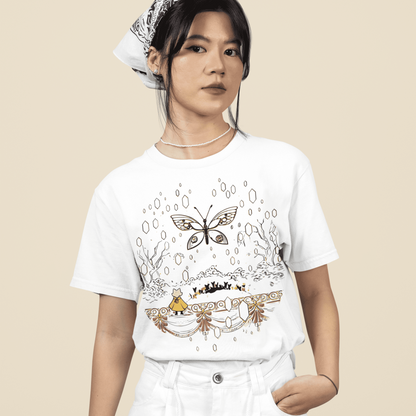 Female model wearing the white Nine Sols Butterfly Tee – Golden Echo in a relaxed studio pose.