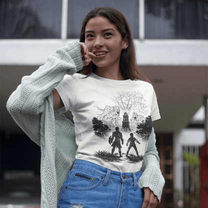 Woman wearing a graphic t-shirt with a sweater and ripped jeans outdoors.