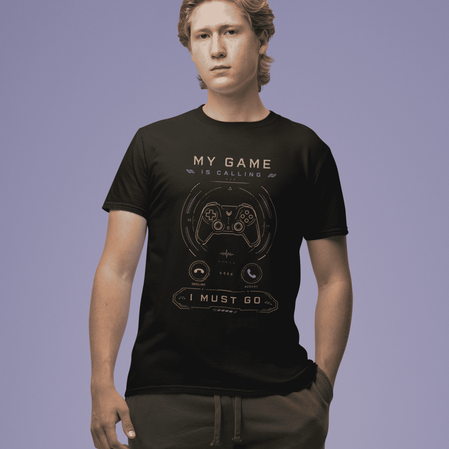 Full body front view of My Game Is Calling T-Shirt – I Must Go Gamer Mood worn by a model on a purple backdrop