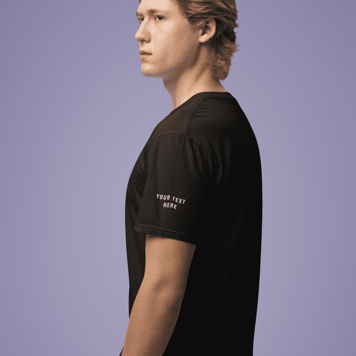 Side view of My Game Is Calling T-Shirt – I Must Go Gamer Mood worn by a model against a purple backdrop
