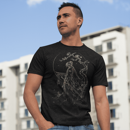 Male model wearing Torii Samurai T-Shirt with quiet warrior gate design in a modern outdoor city setting.