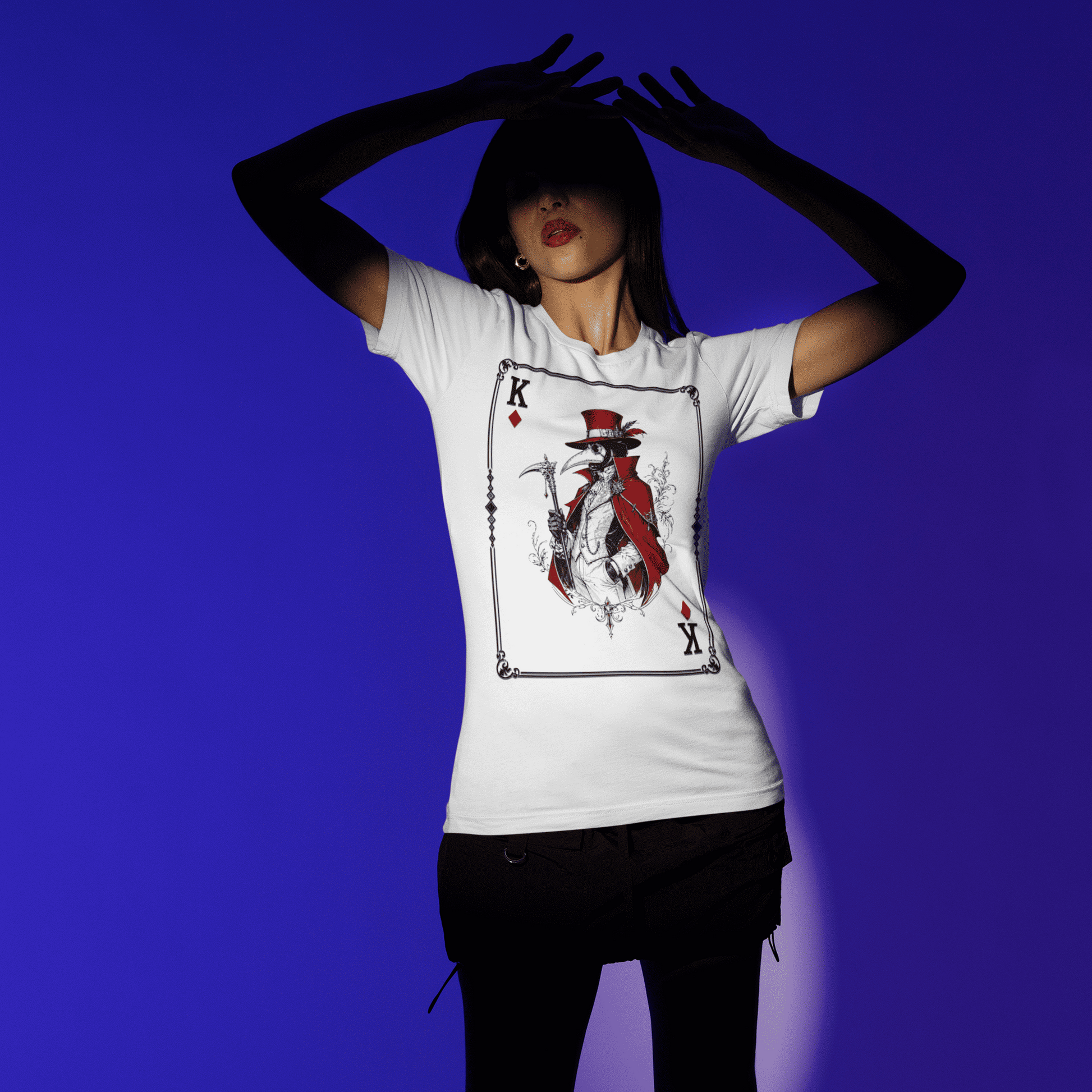 Full-body front pose of a model wearing the white Crowsworn Masked King T-Shirt with the Crimson Card design visible
