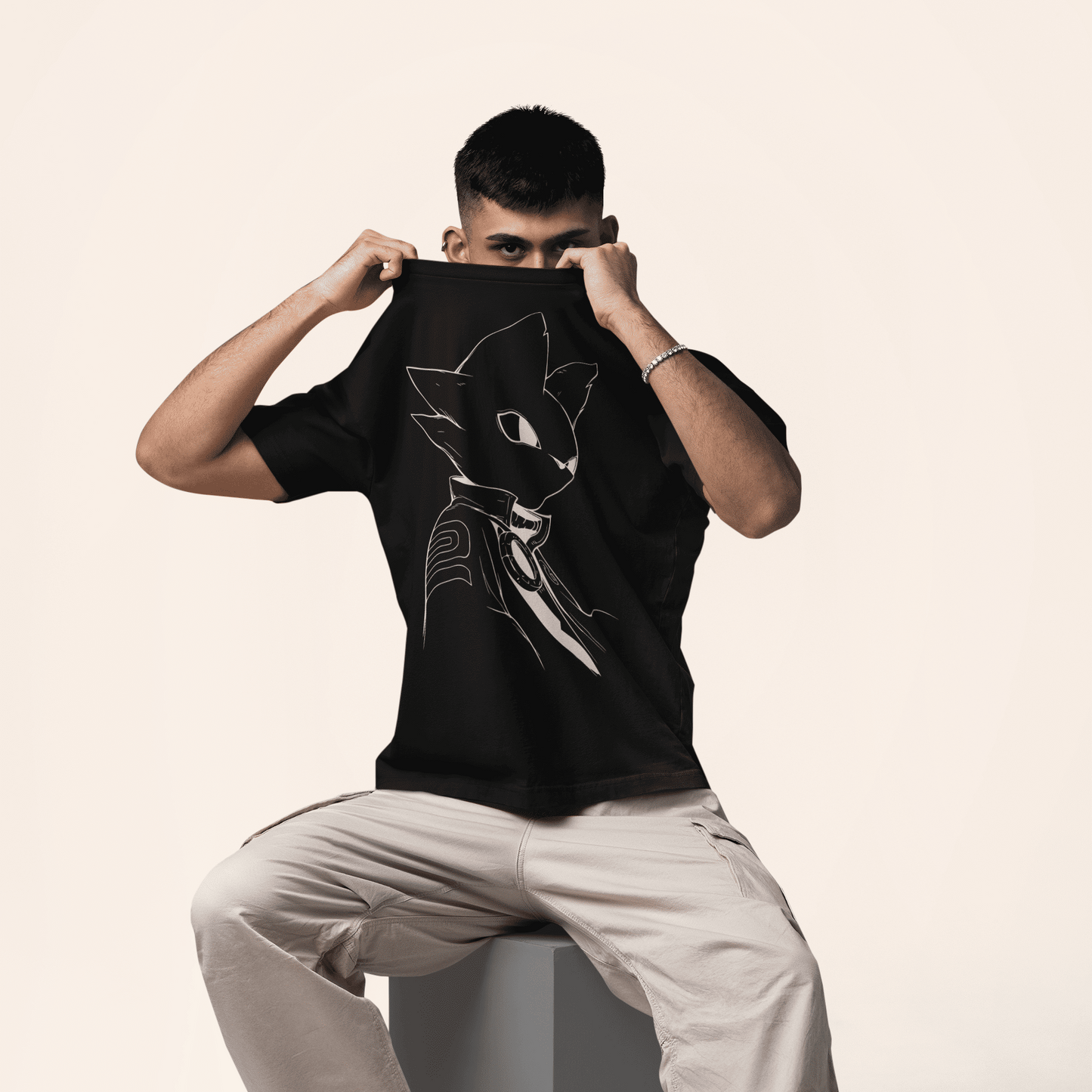 Male model posing on a neutral studio background while wearing the black Nine Sols T-Shirt – Silent Resolve Taopunk Portrait.