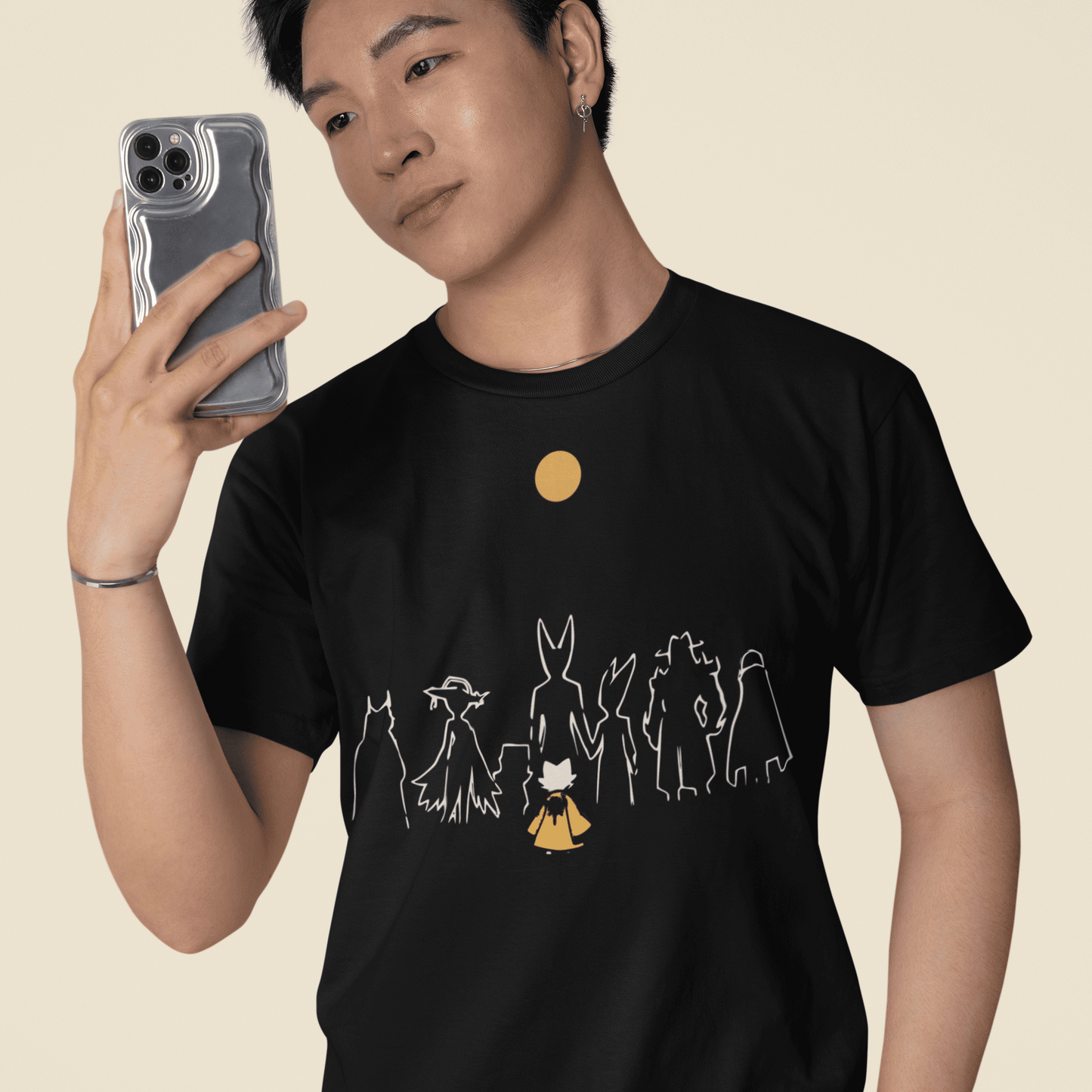 Male model taking a mirror-style selfie while wearing the black Nine Sols Character Tee – Under the Golden Sol.