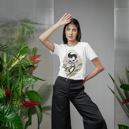 Female model wearing sunglasses and the white Nine Sols Yin Yang Tee – Balance Presence in a modern indoor lifestyle scene.
