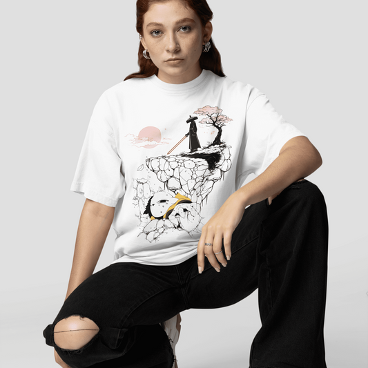 Female model kneeling in a studio pose while wearing the white Nine Sols Fallen Guardian Tee – Silent Cliff Duel.