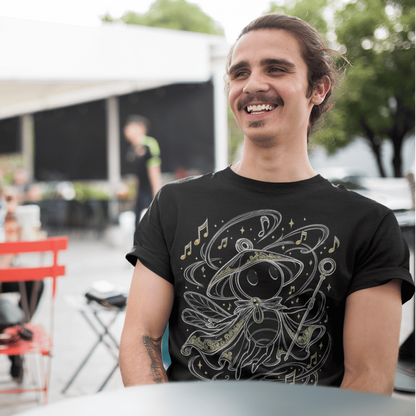 Outdoor front view of Sherma Wandering Melody T-Shirt – Silksong Fan Art worn in a casual street setting