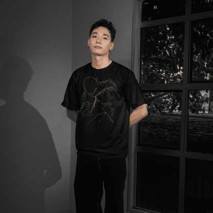 Full-length model wearing The Blood of Dawnwalker Sire Embrace T-Shirt with dark vampiric line art on a black tee.