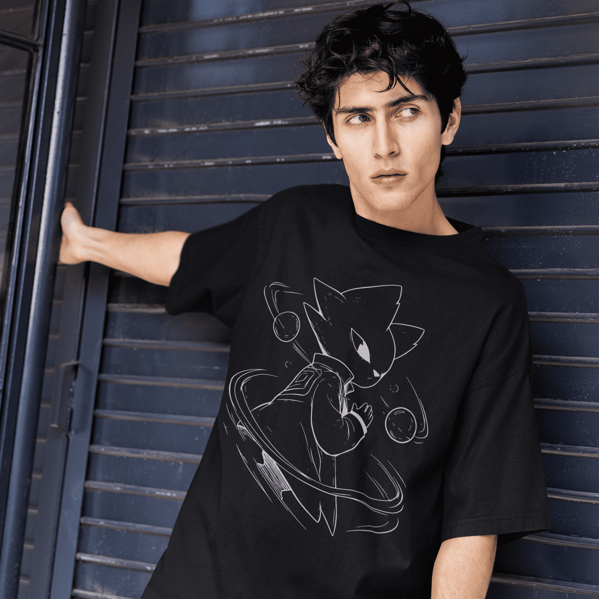 Model leaning against a dark wall wearing the black Nine Sols Graphic Tee – Orbiting Focus Taopunk Motion.