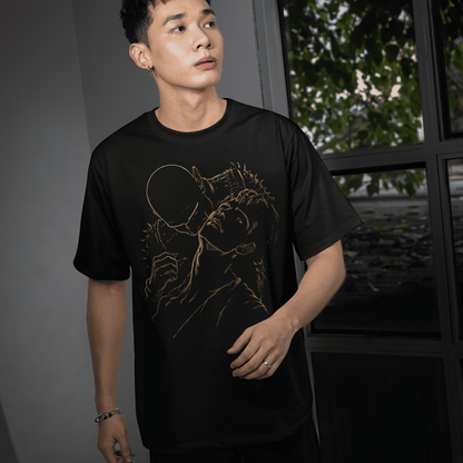Front lifestyle view of a model wearing The Blood of Dawnwalker Sire Embrace T-Shirt with gold gothic vampire artwork.
