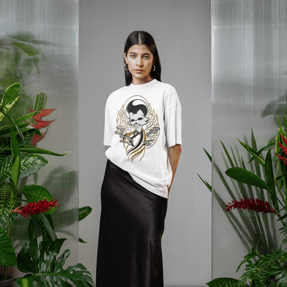 Full-body view of a female model wearing the white Nine Sols Yin Yang Tee – Balance Presence in an indoor plant-filled setting.