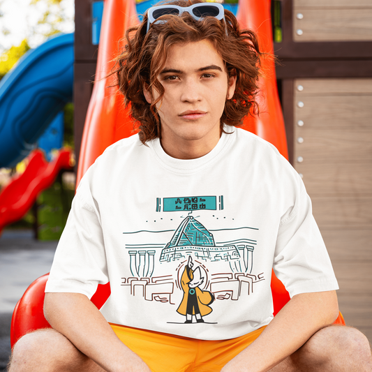 Male model seated on a red playground seat wearing the white Nine Sols Taopunk Tee – Shrine Presence.