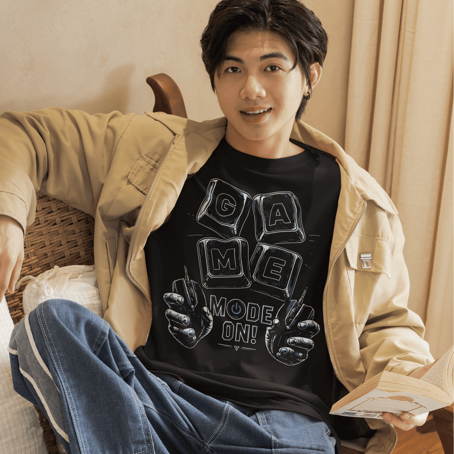 Male gamer relaxing in Game Mode On T-Shirt with setup-inspired artwork in a cozy bedroom gaming scene.