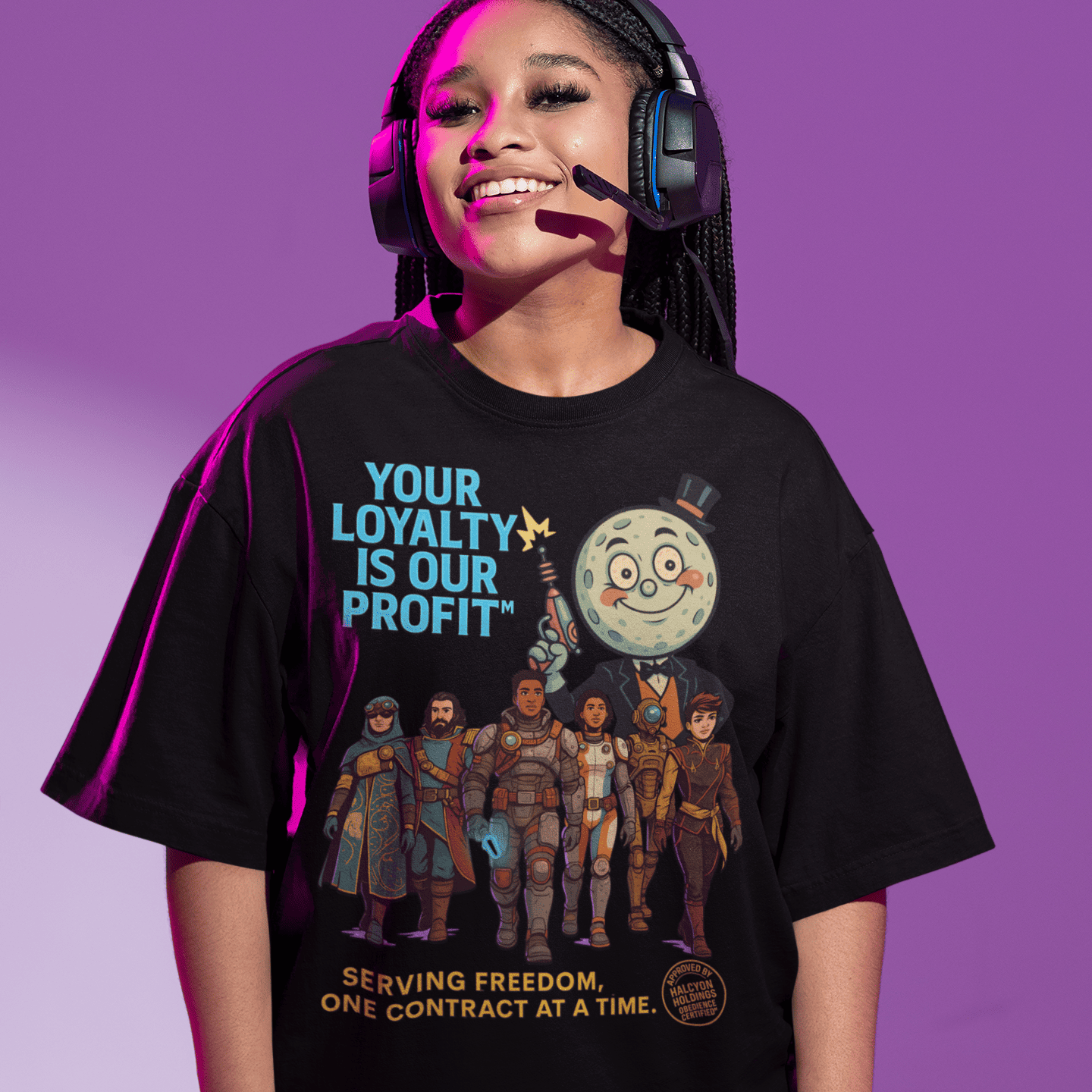 Model wearing The black Outer Worlds 2 Loyalty Is Our Profit T-Shirt showing front design while smiling with gaming headset