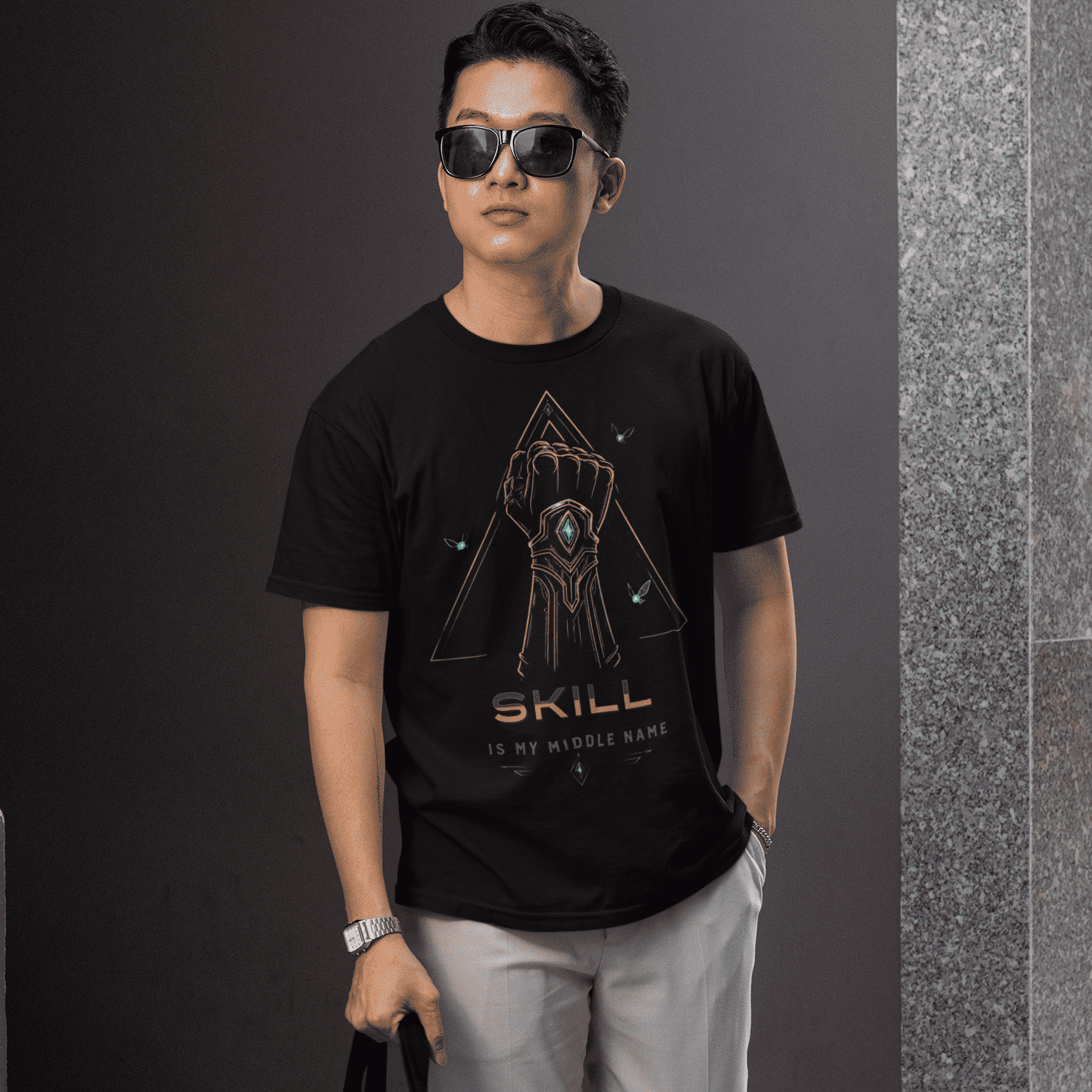 Full body view of Skill Is My Middle Name Gamer T-Shirt with Fantasy Power Art worn with sunglasses and tote bag