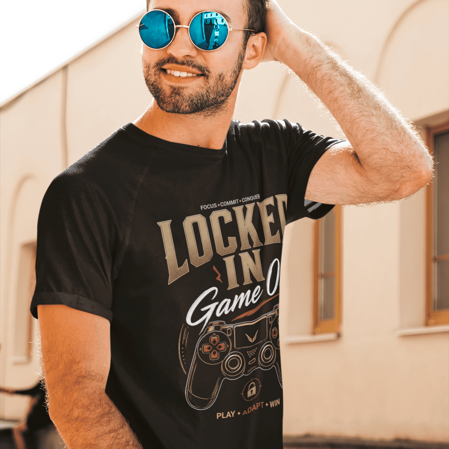 Male model in Locked In Gamer T-Shirt with focus mode gaming design in a bright outdoor lifestyle setting.