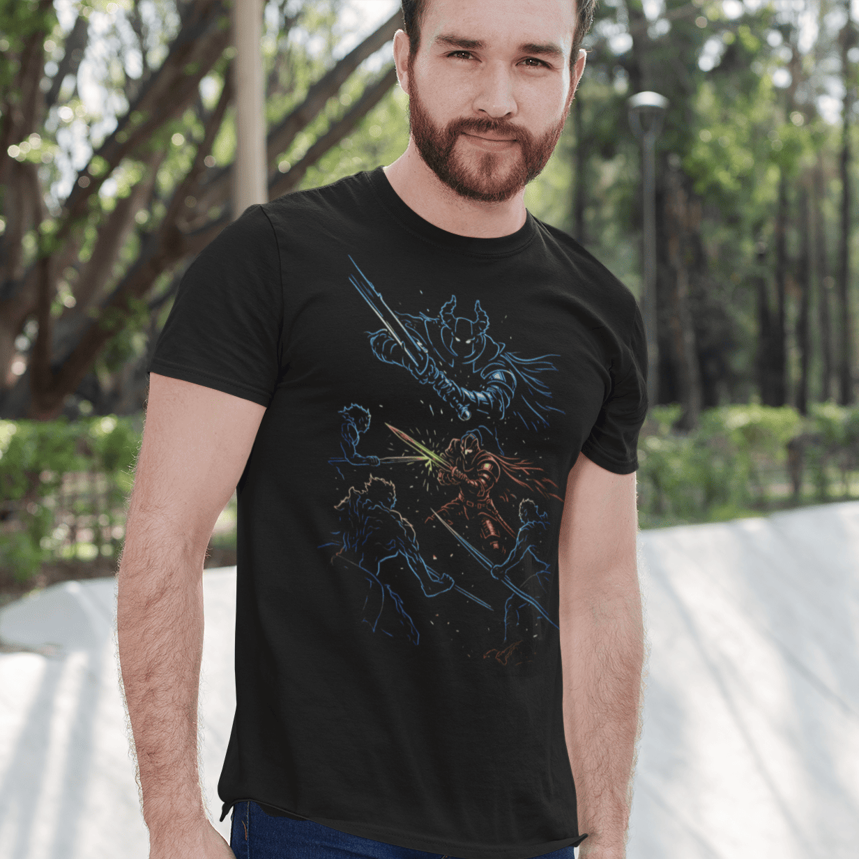 Man wearing a black t-shirt with a graphic design outdoors