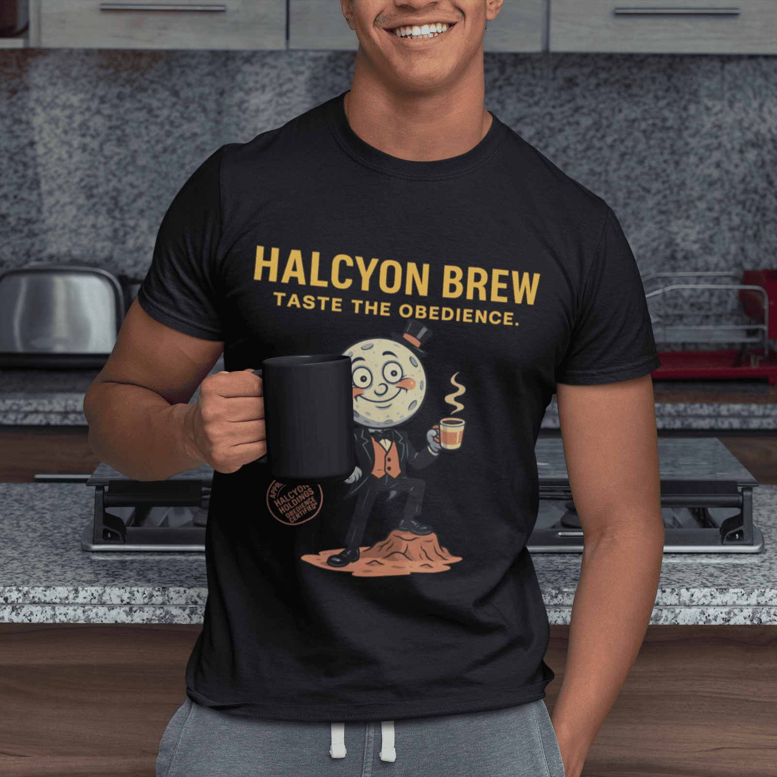 Model wearing The black Outer Worlds 2 Halcyon Brew T-Shirt showing front design in a relaxed indoor pose with a mug
