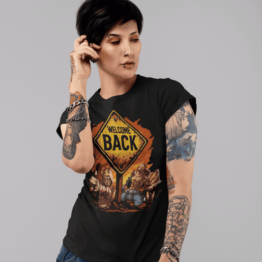 Person wearing a black t-shirt with a graphic design and text, standing against a gray background