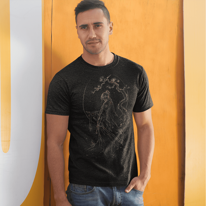 Male model posing in Torii Samurai T-Shirt with minimalist warrior gate design against a modern yellow wall.