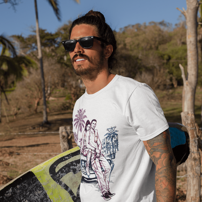 Man holding a surfboard with a tropical design, wearing sunglasses and a white t-shirt with a graphic print.