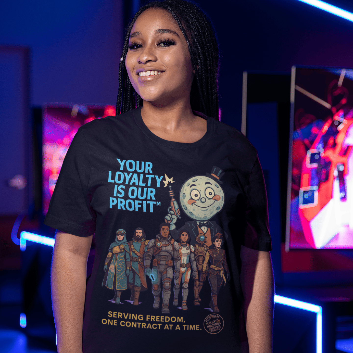 Model wearing The black Outer Worlds 2 Loyalty Is Our Profit T-Shirt showing front artwork in a neon gaming room setting