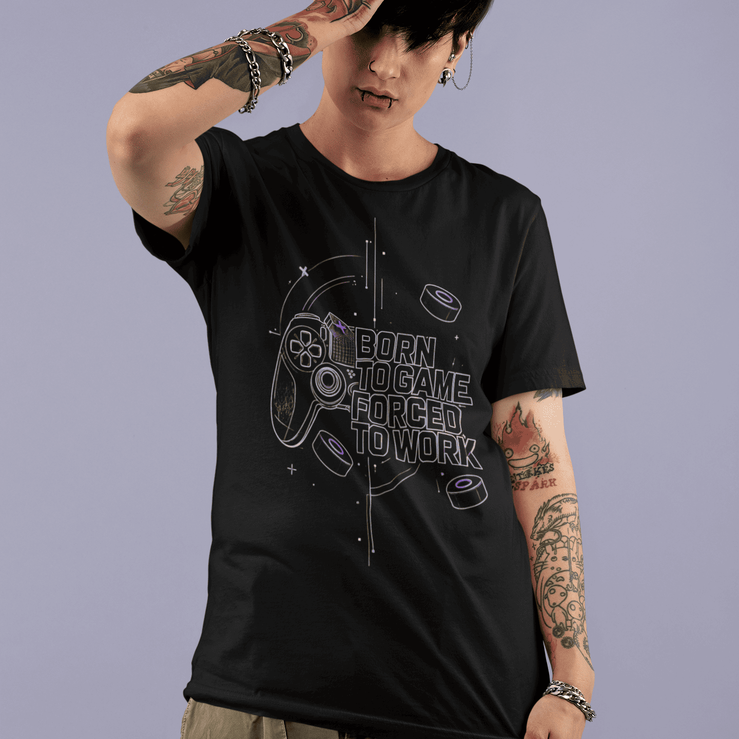 Front view of Born to Game Forced to Work Gamer T-Shirt worn by a model with one hand on the forehead
