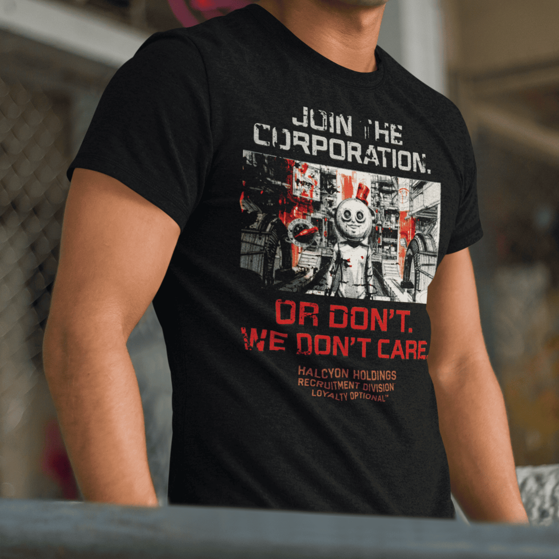 Person wearing a black t-shirt with graphic design and text.